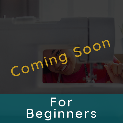 Tile image showing a young woman sitting at a sewing machine representing tutorials for beginners are coming soon.